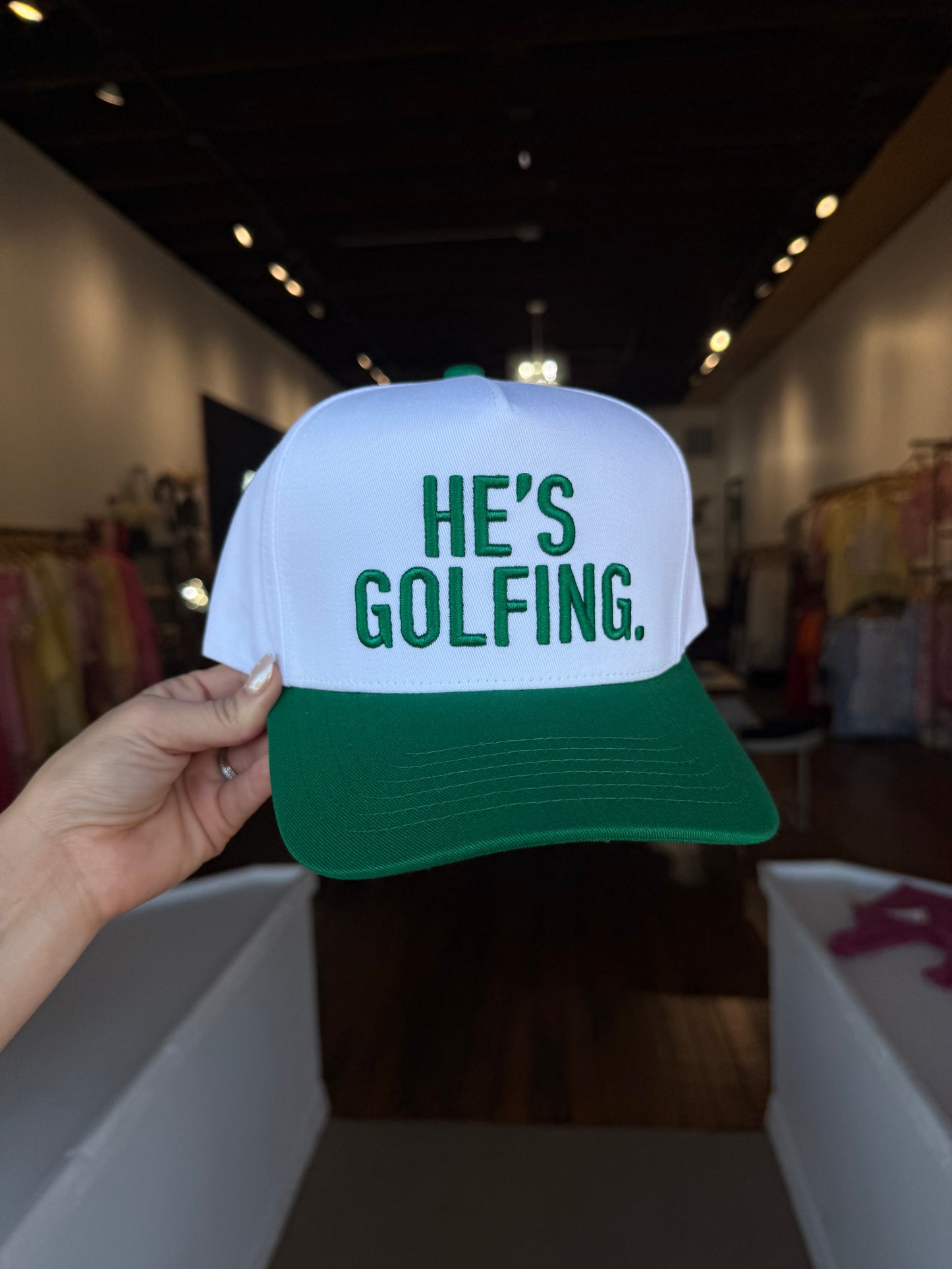 He’s Golfing Trucker Hat